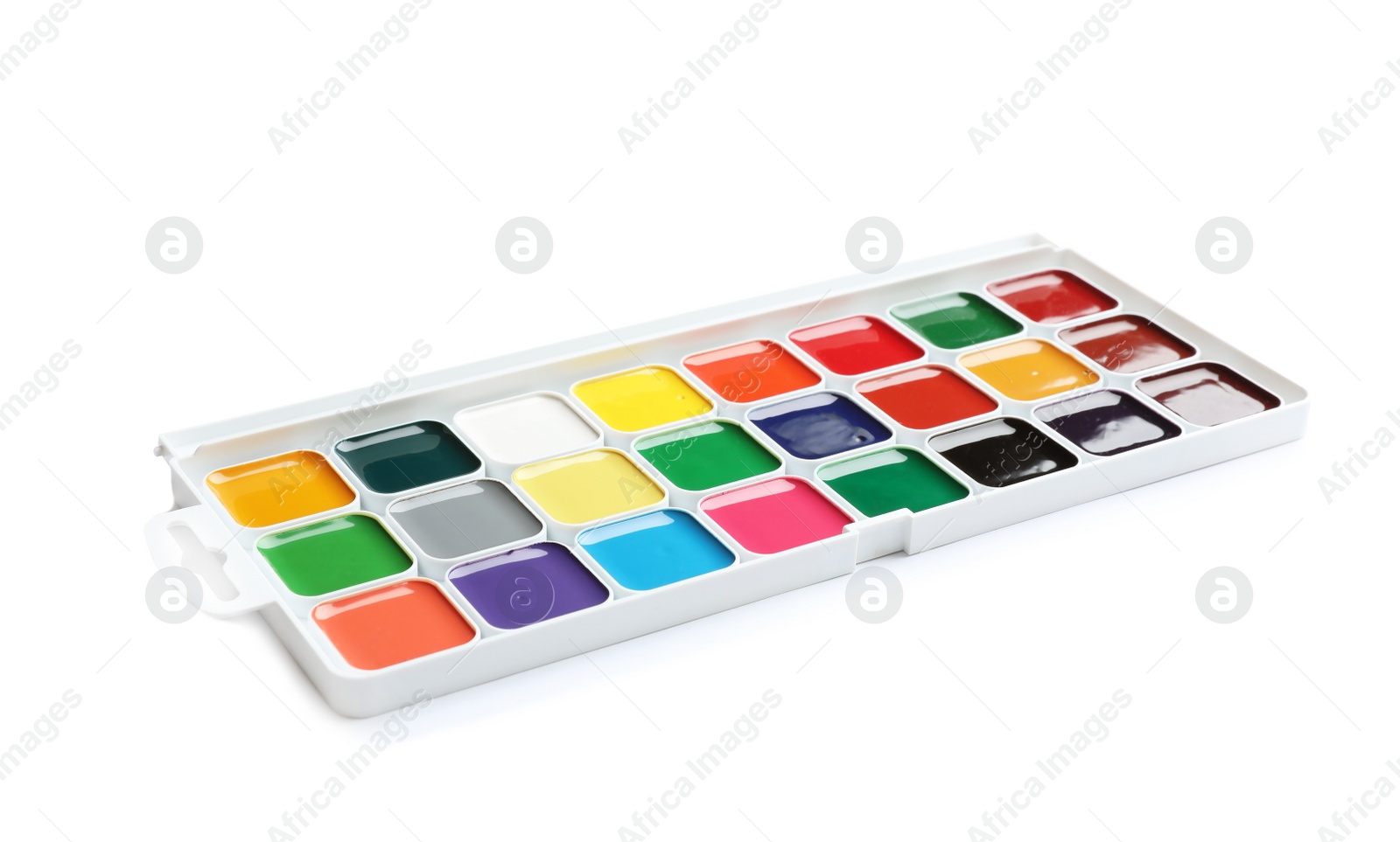 Photo of Plastic watercolor palette on white background. Painting equipment for children