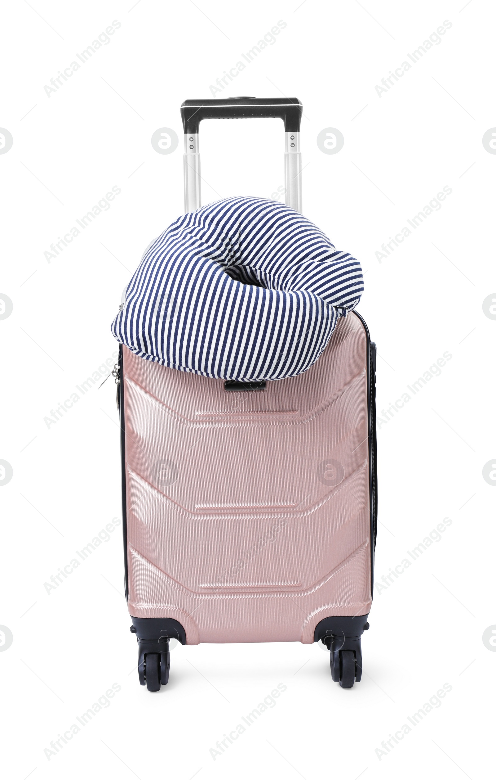 Photo of Soft travel pillow on suitcase isolated on white