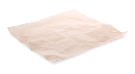 Photo of Sheet of crumpled baking paper isolated on white