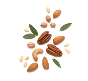 Photo of Different delicious nuts on white background, flat lay