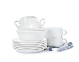 Set of clean tableware on white background. Washing dishes