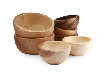 Set of wooden bowls on white background