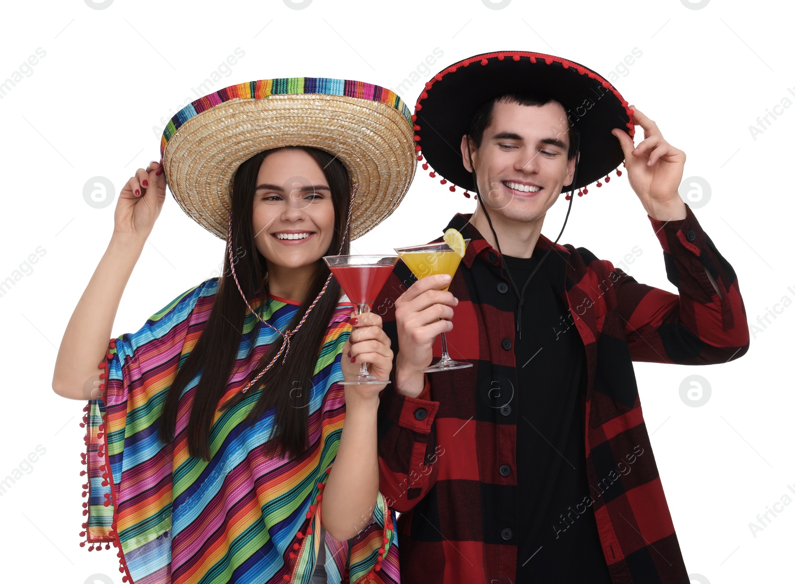 Photo of Lovely couple in Mexican sombrero hats with cocktails on white background