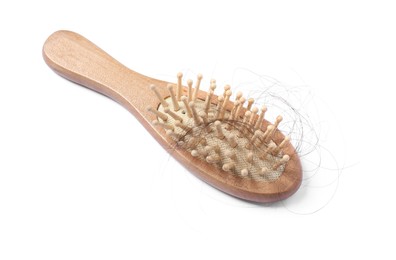 Photo of Brush with lost hair isolated on white