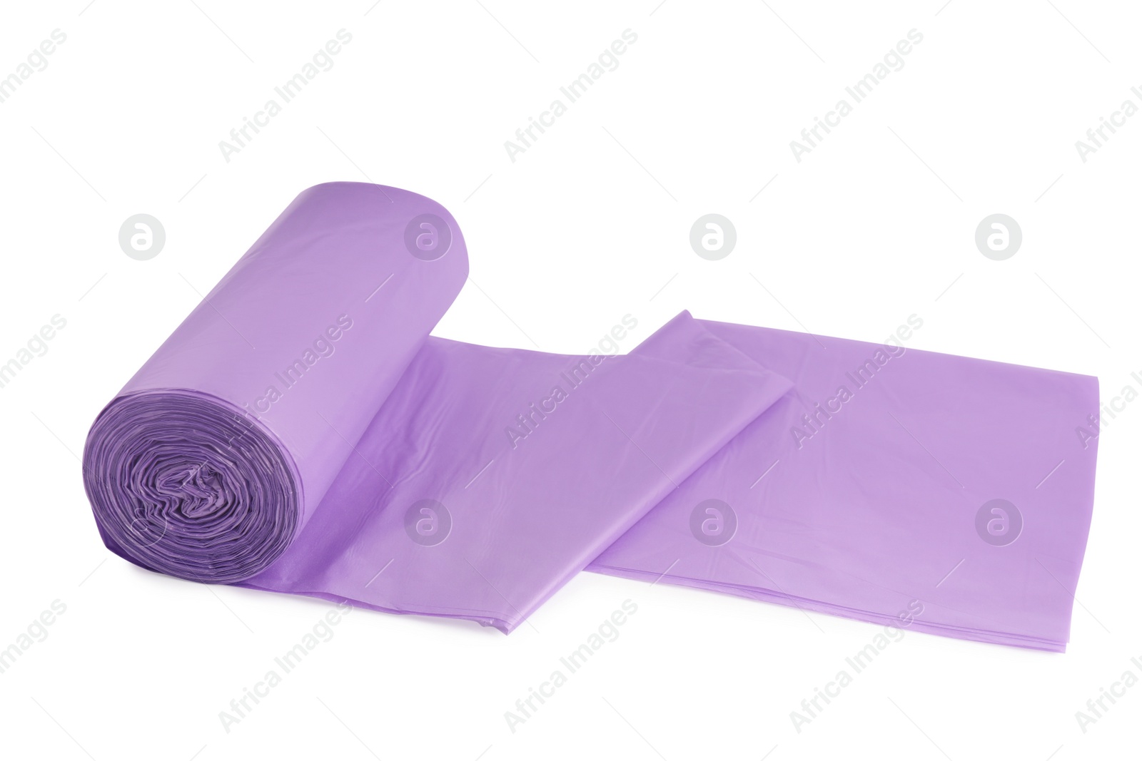 Photo of Roll of violet garbage bags on white background. Cleaning supplies