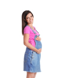 Happy pregnant woman posing on white background