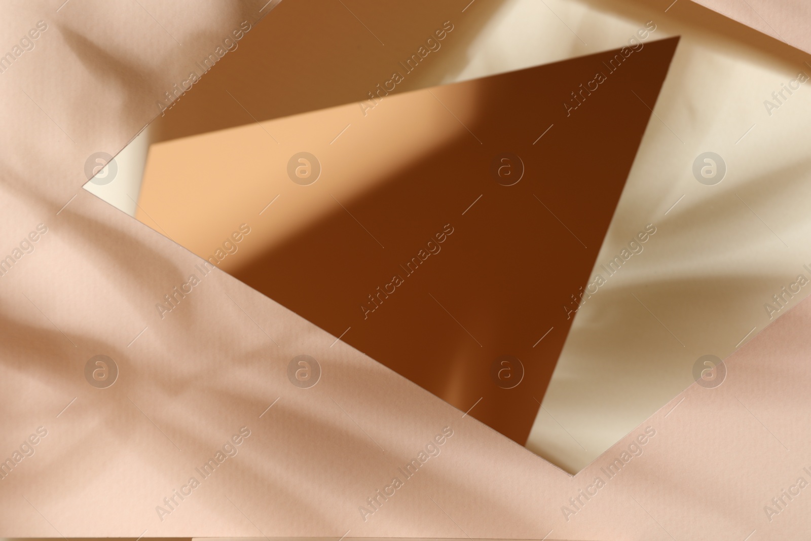 Photo of Presentation of product. Glass surface and shadows on pink background, above view