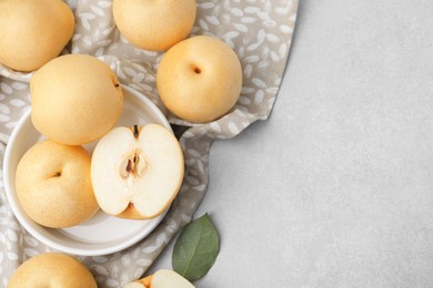 Photo of Delicious apple pear on white table, flat lay. Space for text