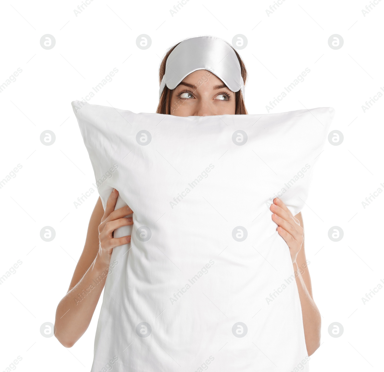 Photo of Beautiful woman with pillow and sleep mask on white background. Bedtime