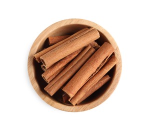 Cinnamon sticks in bowl isolated on white, top view