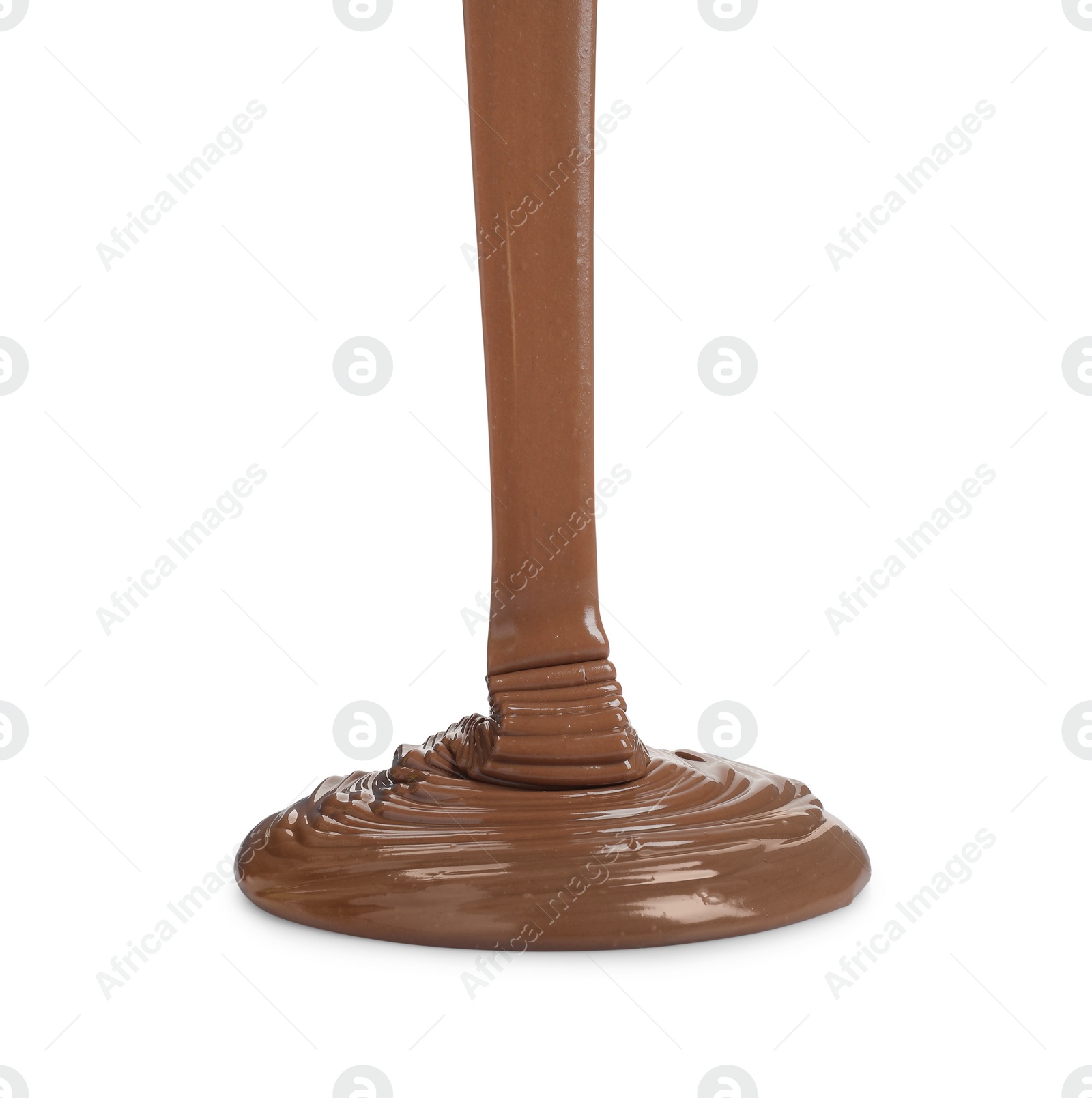 Photo of Pouring tasty melted milk chocolate isolated on white