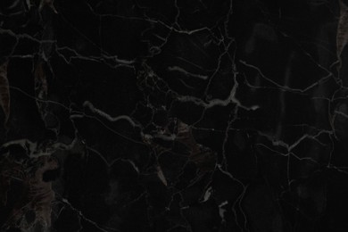 Photo of Black marble surface as background, closeup view