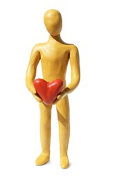 Yellow plasticine human figure with pink heart isolated on white