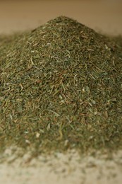 Pile of dried dill on table, closeup