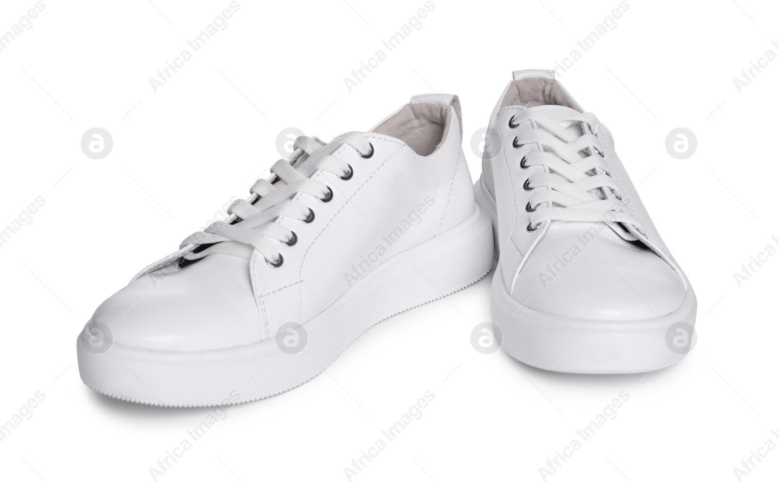 Photo of Pair of stylish sneakers isolated on white