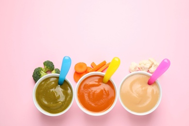 Photo of Healthy baby food and ingredients on pink background, flat lay. Space for text