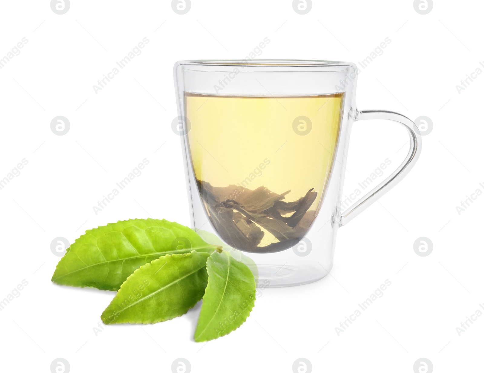 Image of Green tea in glass cup and green leaves isolated on white