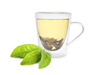 Image of Green tea in glass cup and green leaves isolated on white