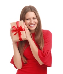 Photo of Happy young woman with Christmas gift on white background