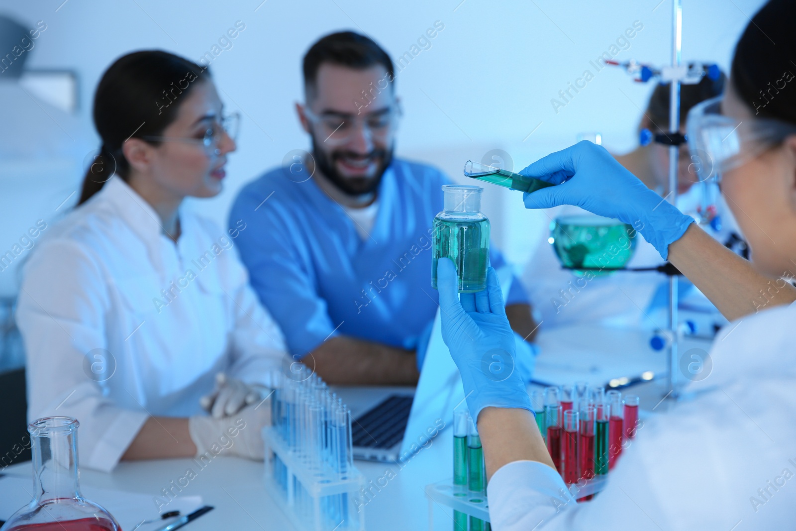 Photo of Medical students working in modern scientific laboratory