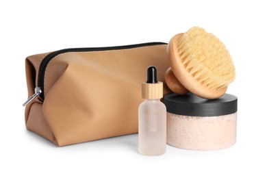 Photo of Preparation for spa. Compact toiletry bag and different cosmetic products isolated on white