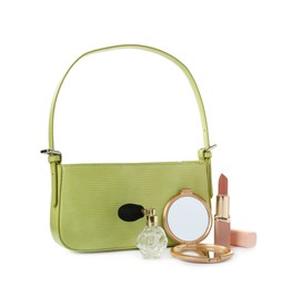 Photo of Stylish baguette bag with perfume, pocket mirror and lipstick isolated on white