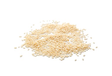 Photo of Dry raw sesame seeds on white background