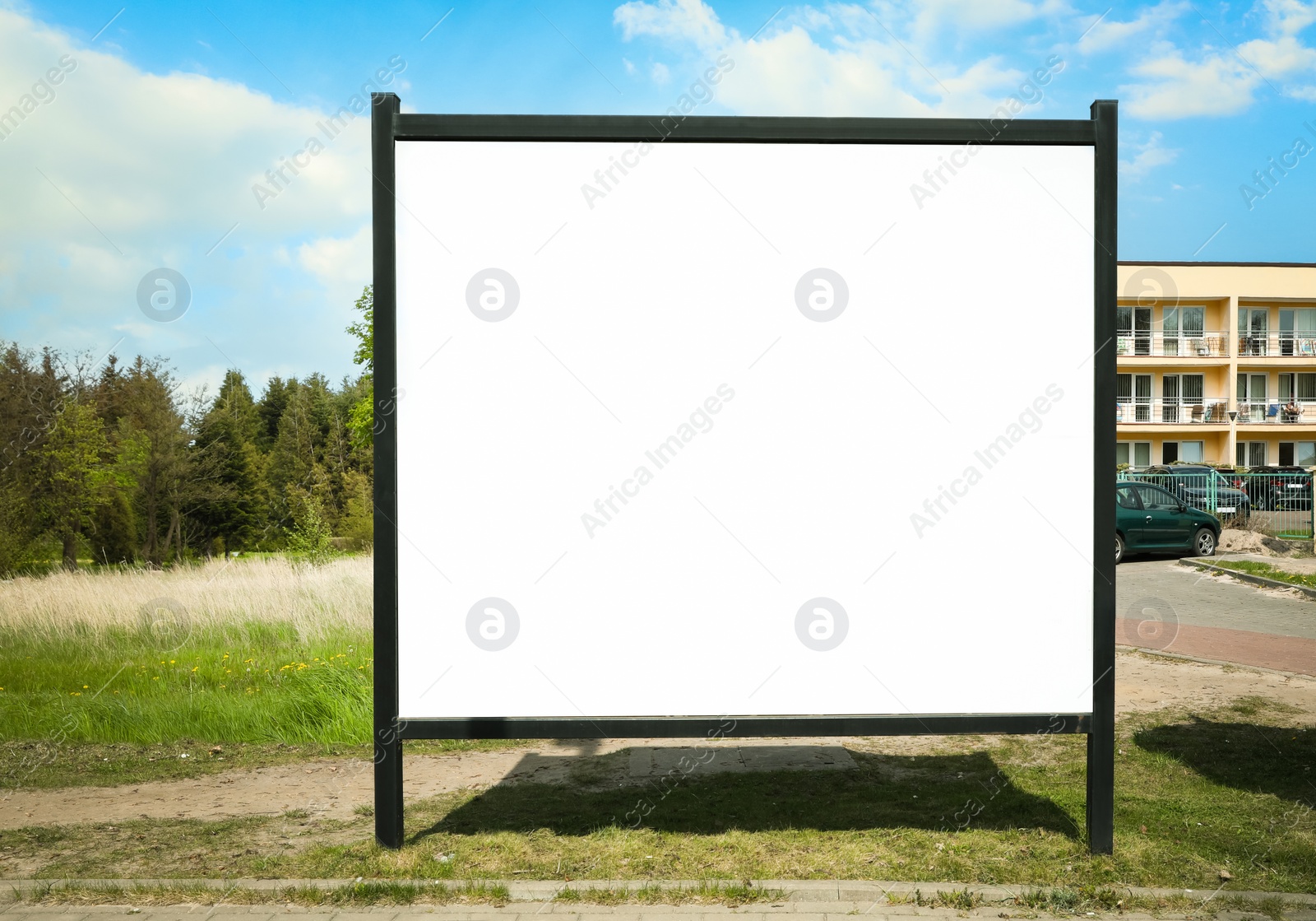 Image of Empty signboard outdoors on sunny day. Mock-up for design