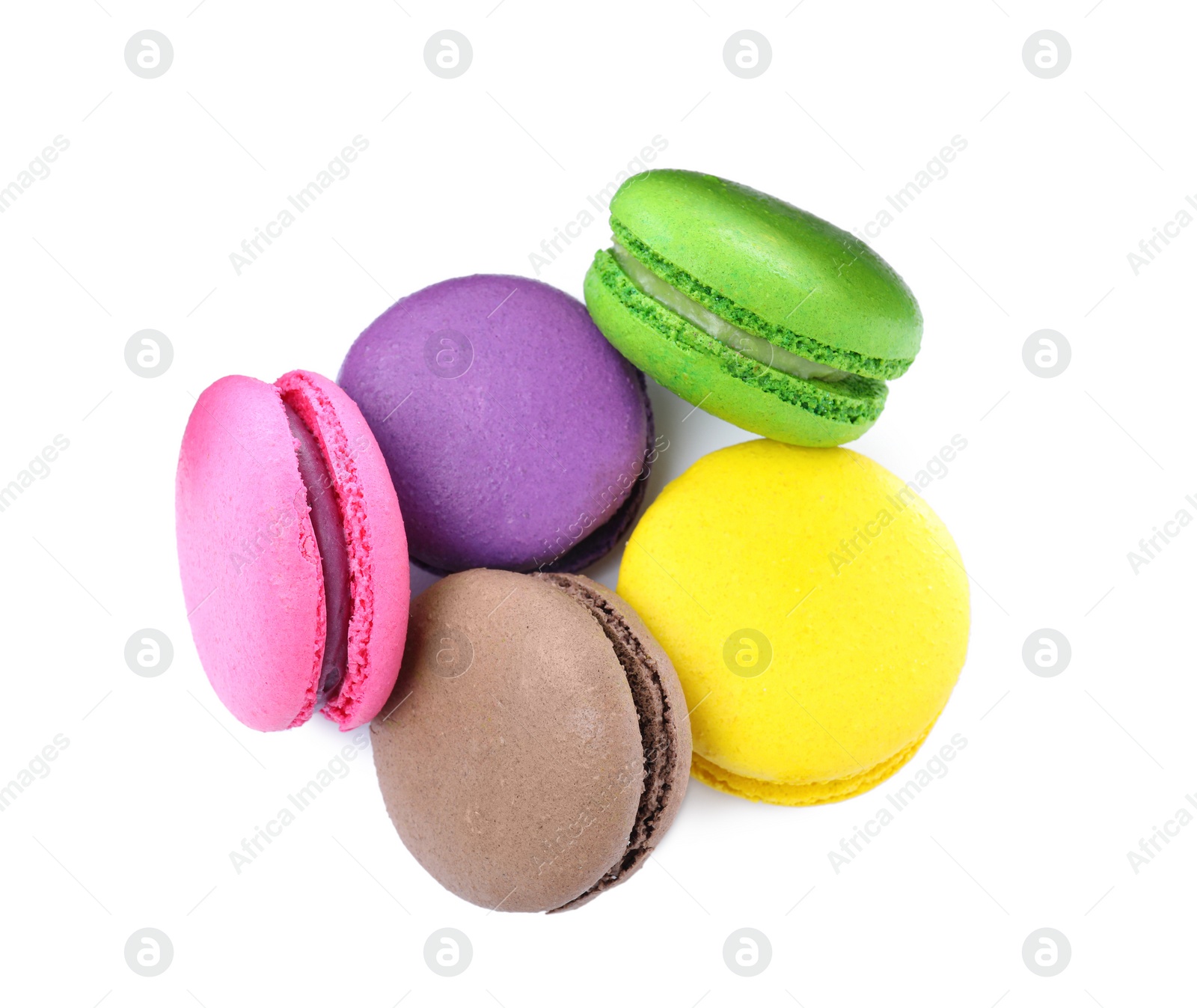 Photo of Different delicious colorful macarons on white background, top view