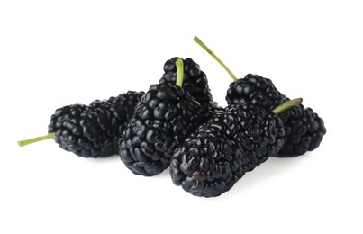 Many fresh ripe black mulberries on white background