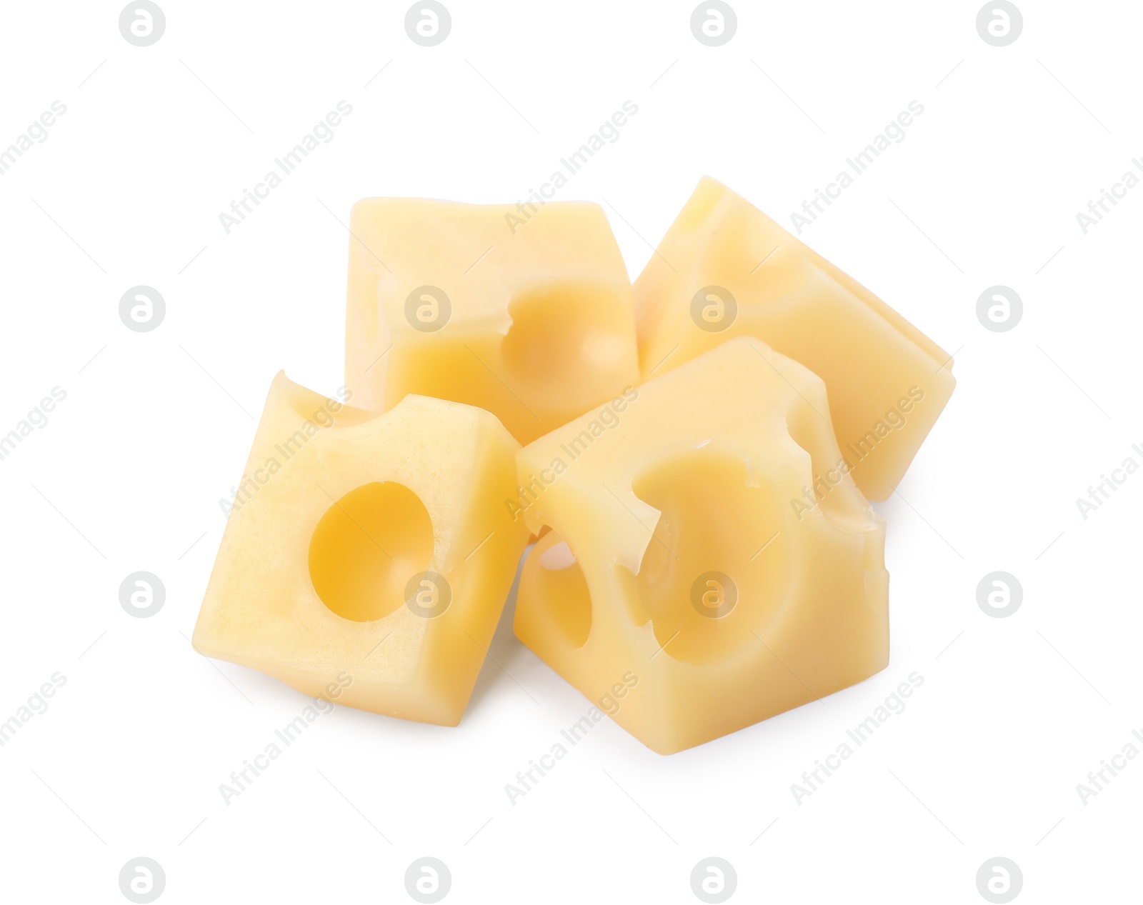 Photo of Cubes of delicious cheese isolated on white