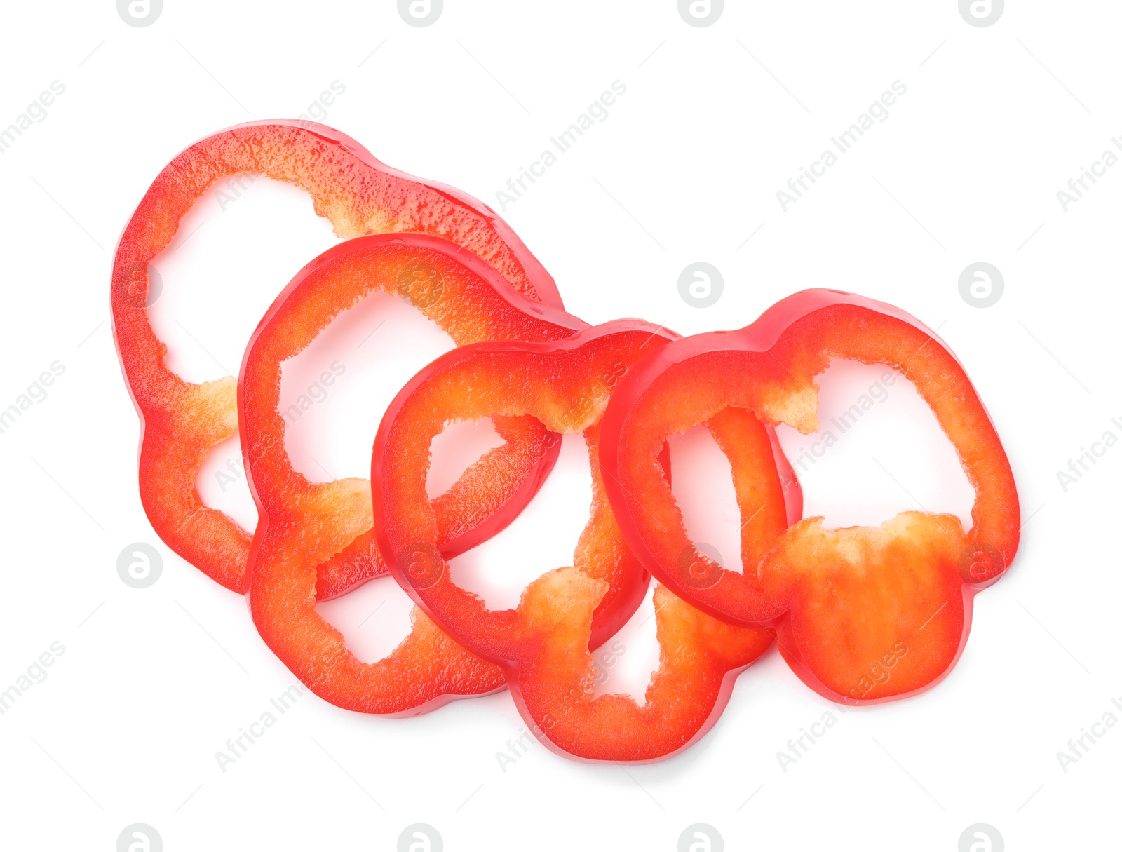 Photo of Slices of red bell pepper on white background, top view