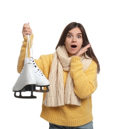 Photo of Emotional woman with ice skates on white background