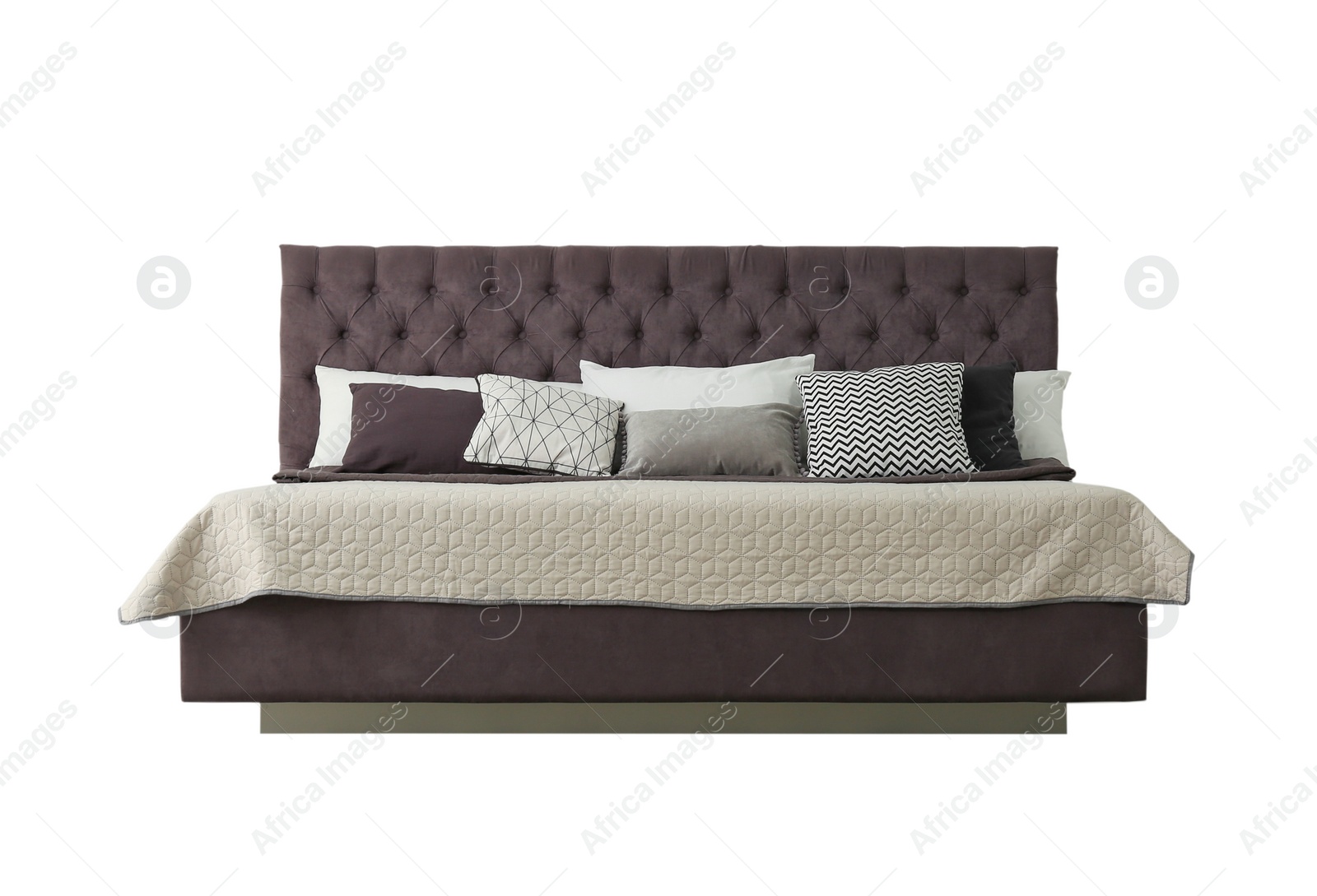 Image of Elegant cozy bed with headboard, blanket and pillows on white background