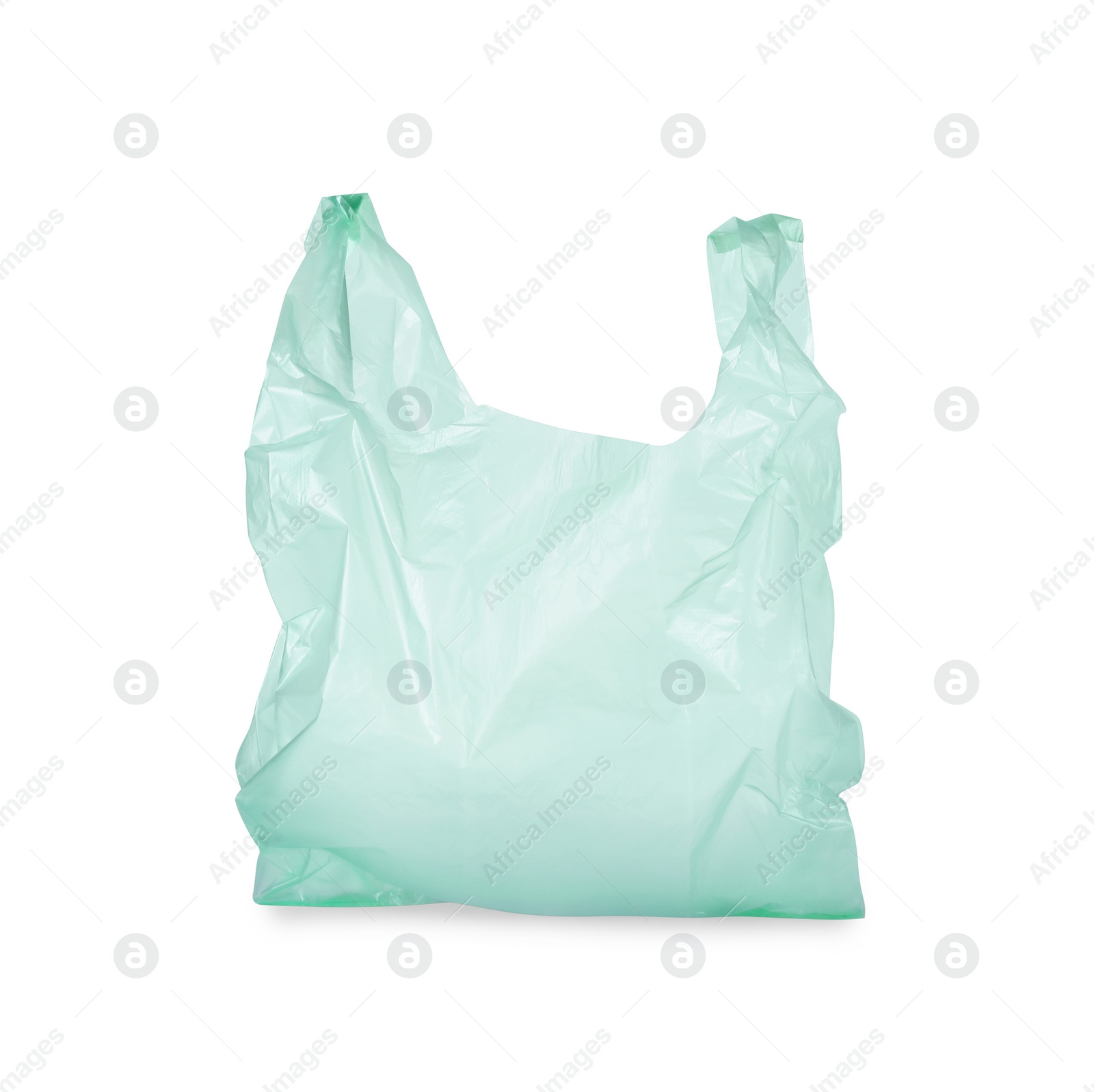 Photo of One light green plastic bag isolated on white