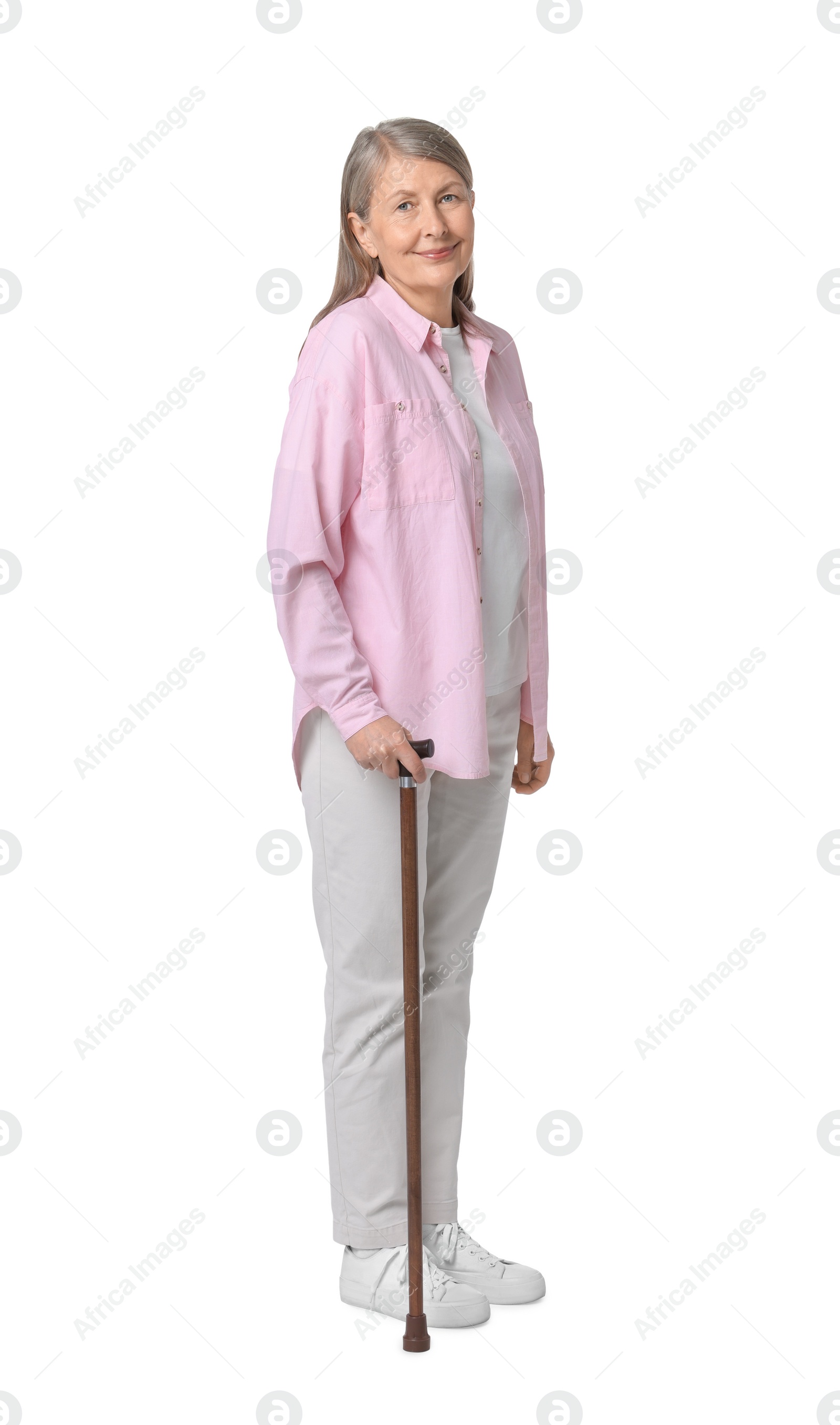 Photo of Senior woman with walking cane on white background