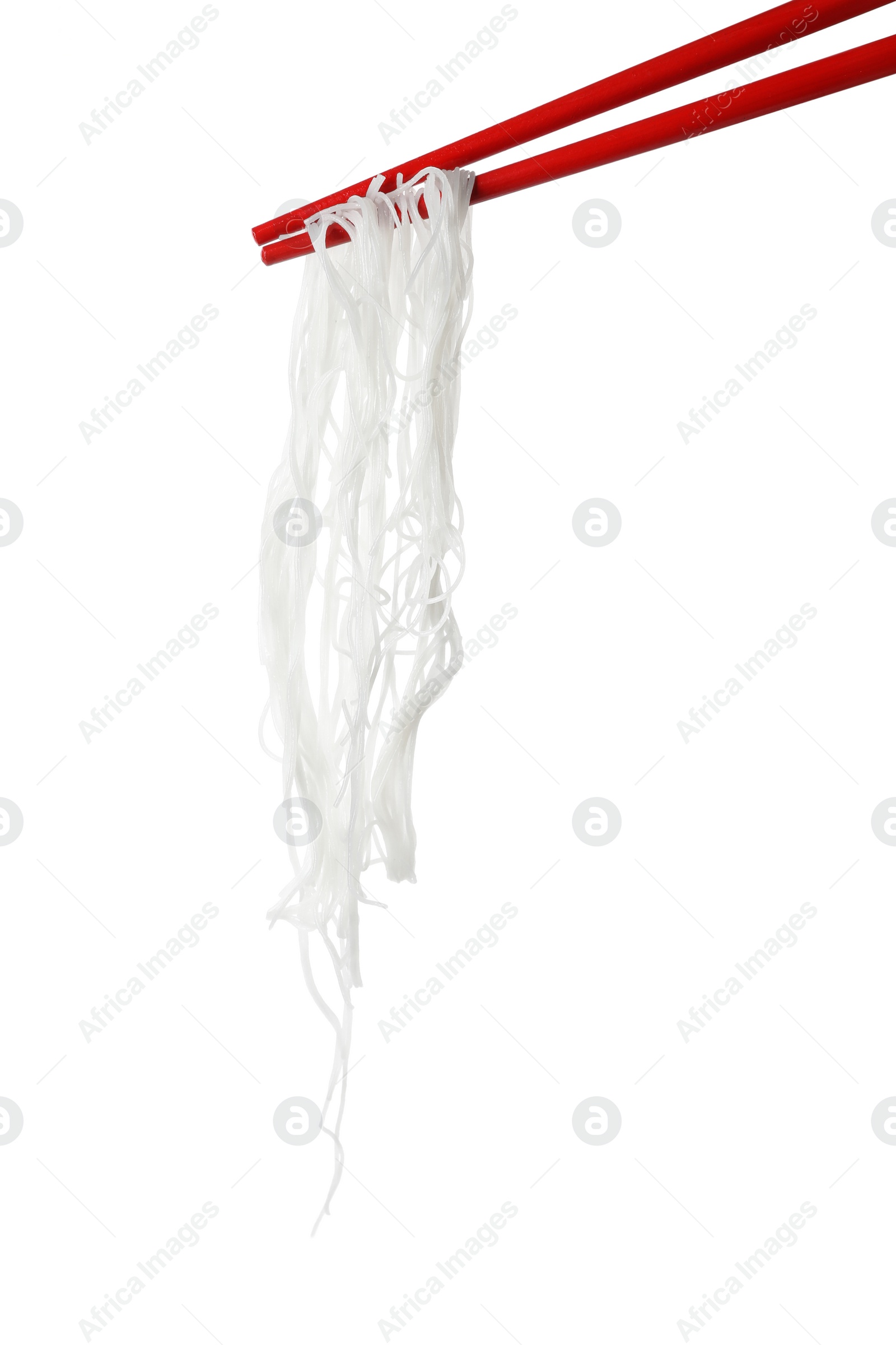 Photo of Chopsticks with tasty cooked rice noodles isolated on white