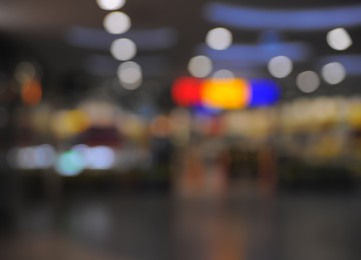 Photo of Blurred view of shopping mall interior. Bokeh effect