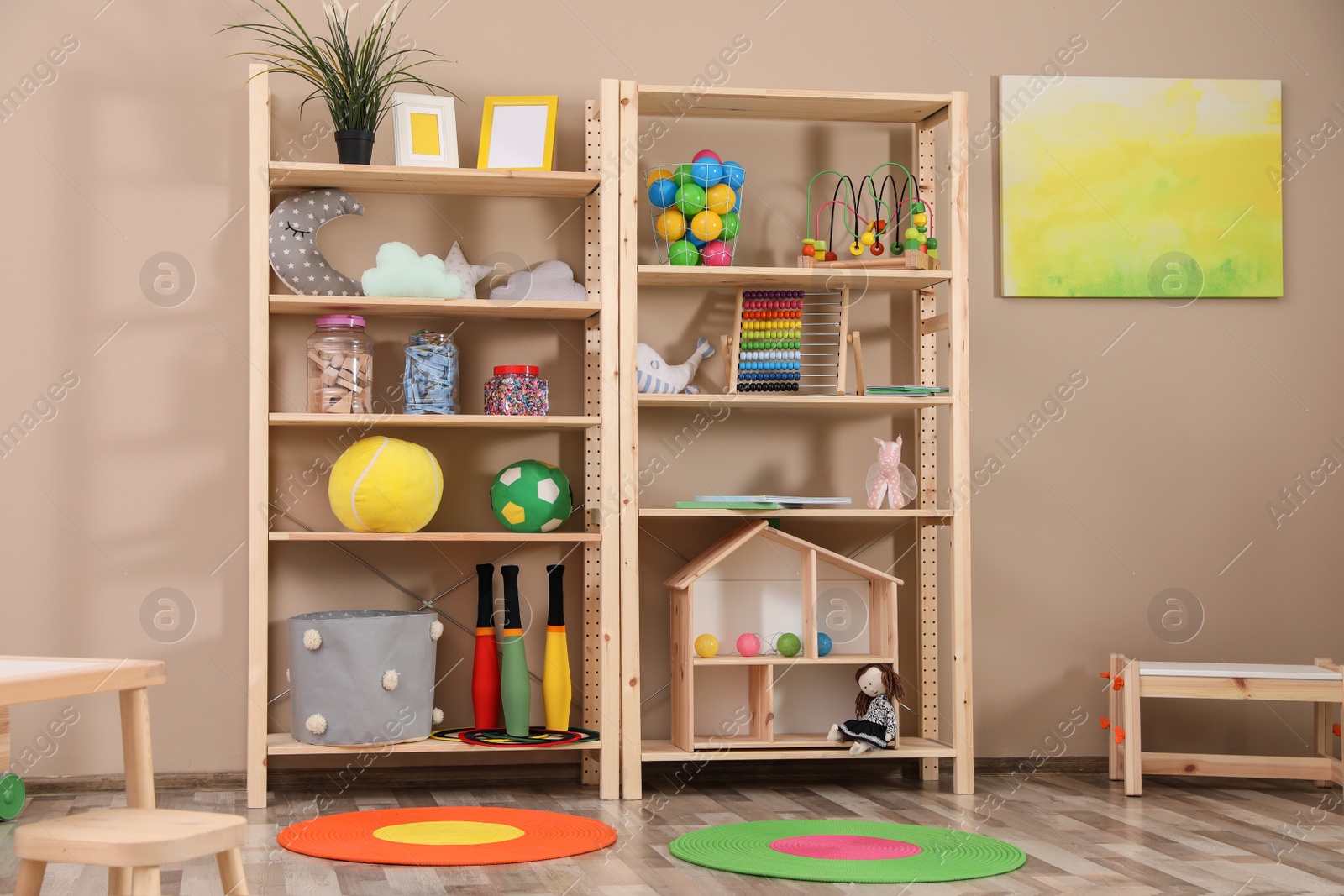 Photo of Storage for toys in colorful child's room. Idea for interior design