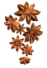 Image of Dry aromatic anise stars falling on white background