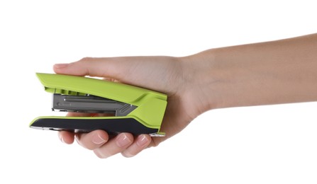 Woman holding bright stapler on white background, closeup