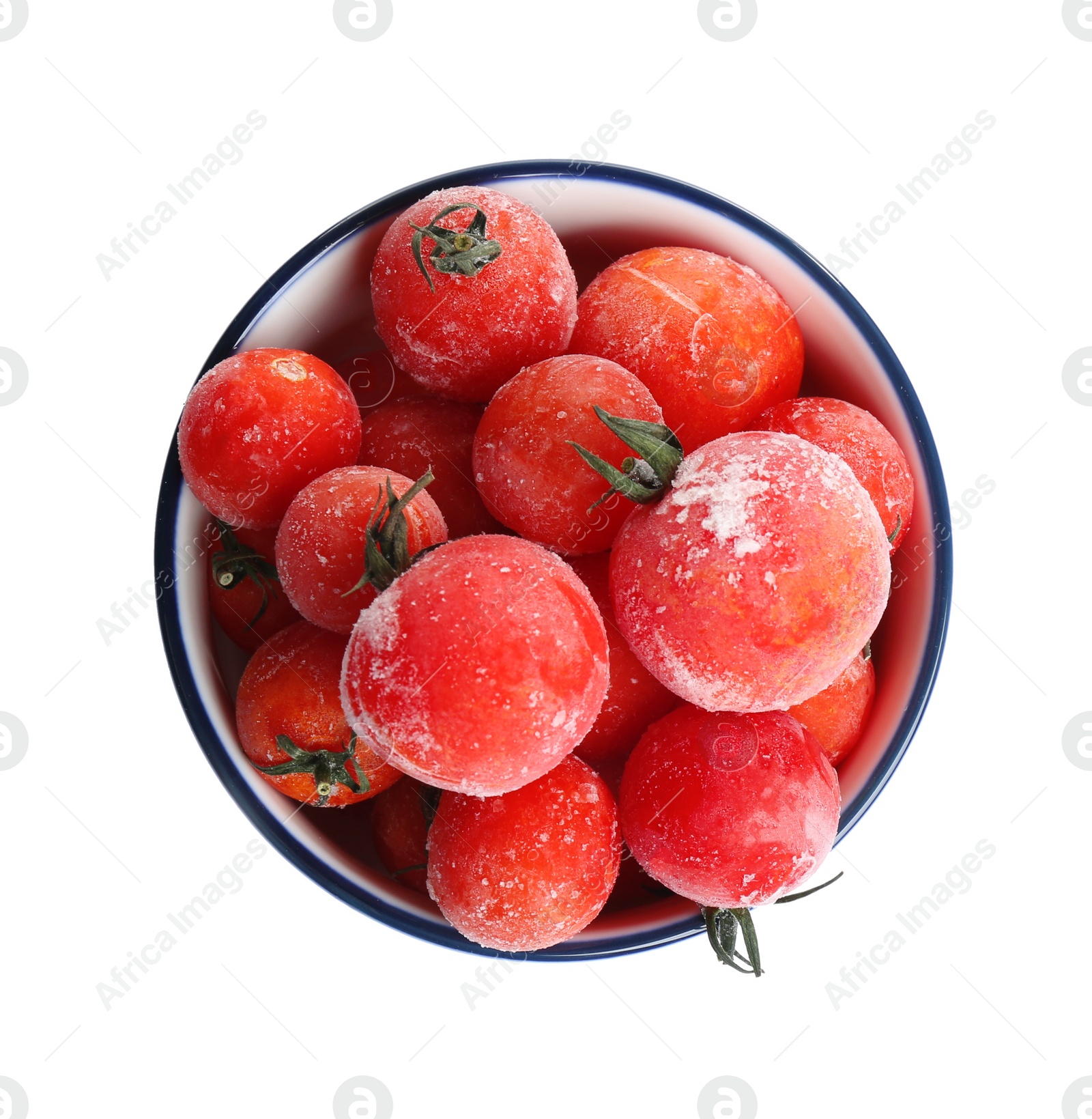 Photo of Frozen tomatoes in bowl isolated on white, top view. Vegetable preservation