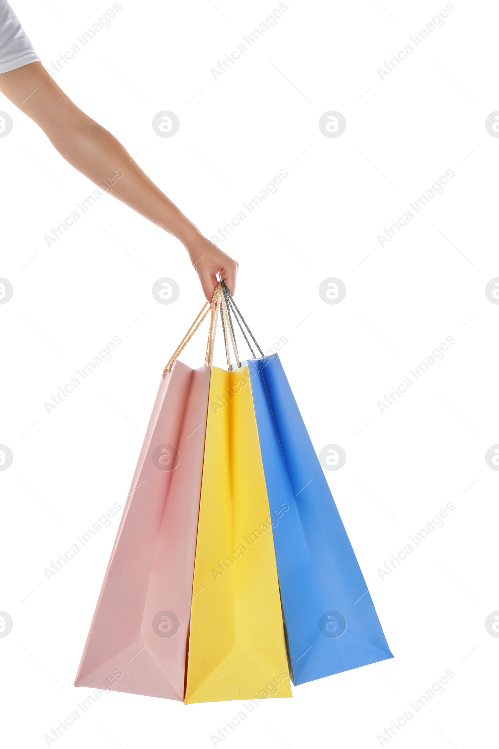 Photo of Woman with paper shopping bags on white background, closeup