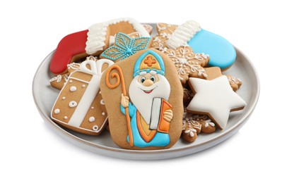 Photo of Tasty gingerbread cookies on white background. St. Nicholas Day celebration
