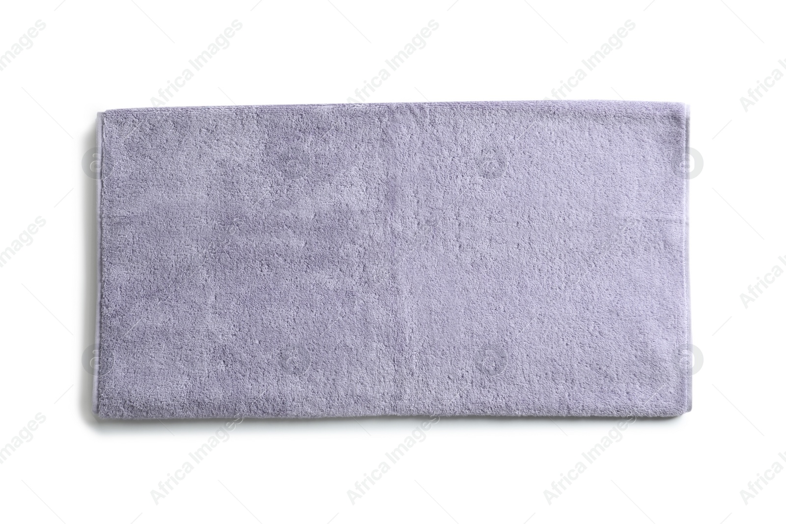 Photo of Soft folded towel isolated on white, top view