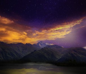 Image of Fantastic sky with many stars and beautiful clouds over mountains