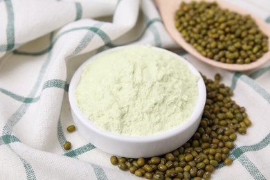 Photo of Bowl of flour and mung beans on cloth