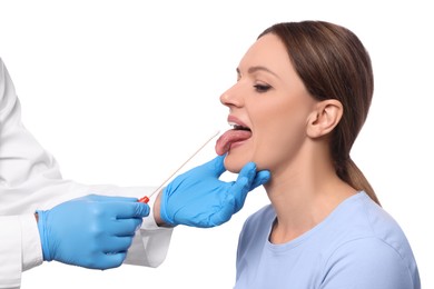 Photo of Doctor taking throat swab sample from woman`s oral cavity on white background