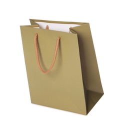 Photo of One brown shopping bag isolated on white