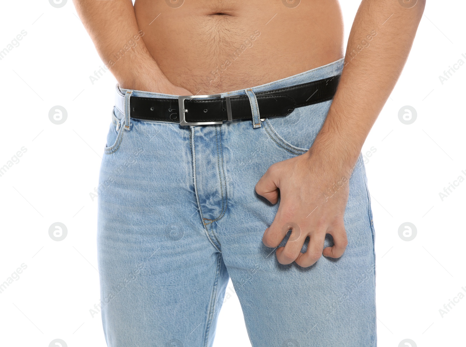 Photo of Man scratching crotch on white background, closeup. Annoying itch